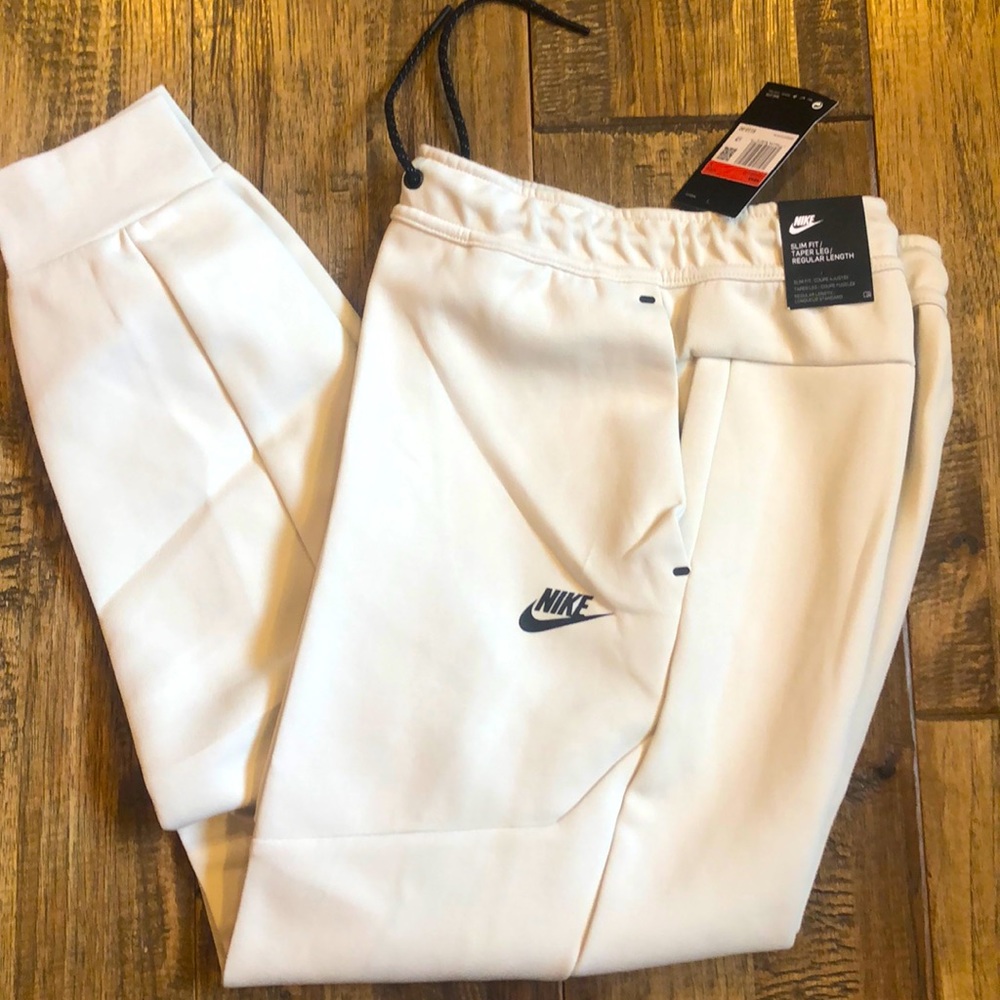 Nike cream and black joggers in size large NWT